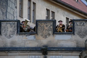 Clad in medieval attire, a brass quartet serenades those at the Mala Strana end of the Charles Bridge.