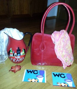 Kirstie found some things to bring home, most of them red, except for the WC sign, a topic of a KentInPrague.com blog she wrote.  (photo by Kirstie Ratzer-Farley)